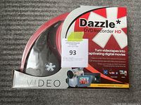 Front view of Dazzle DVD Recorder HD box with product visible inside a transparent window.