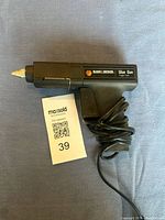 Photo of the Black & Decker glue gun showing full view with power cord coiled.