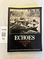 Front cover of the book showing a historic black and white photo of boats on an inlet, with title and authors clearly visible.