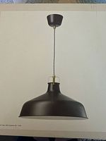 Photo of the black IKEA Ranarp ceiling lamp hanging fixture, showing the shape, size, and design.