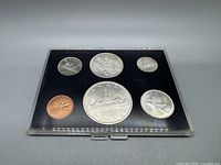 Front view of the 1965 Canadian proof coin set in protective plastic case displaying 6 coins.