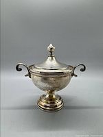 Early .800 silver sugar bowl with lid showing both handles and finial on lid