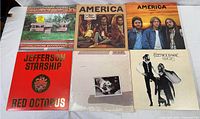 Top view of all six album covers showing artists and titles: Daryl Hall & John Oates, America (2 editions), Jefferson Starship Red Octopus, Fleetwood Mac Rumours