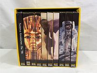 Front view of 10 CD ROM cases representing decades from 1880s to 1990s, with thematic images on each spine.