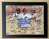 Full view of framed 1980 Phillies World Series champions poster with player images and signatures