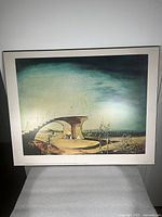 Full view of Salvador Dali art poster titled 'The Broken Bridge and the Dream' showing bridge with stairs and surreal human figures in a dreamlike landscape.