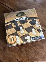 Box of Classic Games chess set showing the cover with chessboard and pieces.