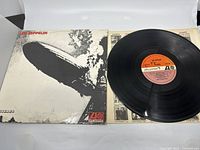 Front cover of Led Zeppelin I original 1969 Spain pressing vinyl record showing Zeppelin airship and Atlantic logo.