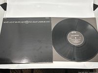 Front cover of The Velvet Underground LP 'White Light/White Heat' and vinyl record beside it showing Verve Records label.