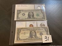 Photo showing both sets of items: 1957 Silver Certificate $1 bill with 1957 penny and nickel; 1963 Barr Note $10 bill with 1963 silver dime in protective sleeves.