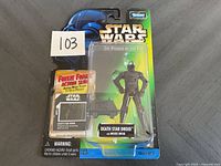 Star Wars Death Star Droid figure with Mouse Droid in original sealed packaging showing front with freeze frame action slide