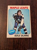 Front of the 1975-76 O-Pee-Chee Borje Salming hockey card showing player image, team, and position.