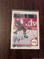 Front side of the signed 1990-91 Upper Deck Bob Rouse hockey card showing player image and signature