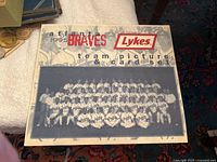 Front of the calendar showing the 1995 Atlanta Braves team picture in black and white with the Lykes logo and title.