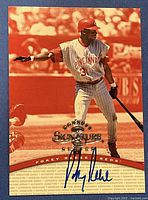 Front of 1997 Donruss Signature Pokey Reese Reds baseball card showing player in action with autograph across bottom