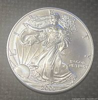 Obverse side of the 2000 US Silver Eagle showing Lady Liberty and inscriptions.