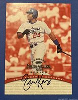 Front of 1997 Donruss Signatures Eric Karros baseball card showing player image and autograph signature