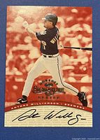 Front of 1997 Donruss Signatures Antoine Williamson autographed baseball card showing player in Brewers uniform with bat and autograph.