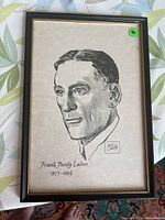 Framed Milton Caniff print showing head and shoulder portrait of aviator Frank Purdy Lahm, dated 1877-1963 with signature box.