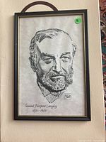 Framed black and white print showing a detailed sketch of Samuel Pierpont Langley with artist signature Milton Caniff
