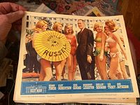 Color lobby card for The Best Man (1954) showing Henry Fonda and female characters in swimsuits
