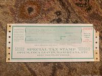 Front view of 1969 Nebraska IRS Special Tax Stamp Permit for narcotics with visible text, perforations, and serial number.