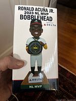Front of the unopened Ronald Acuña Jr. 2023 NL MVP Bobblehead box showing the bobblehead image and sponsor Delta.