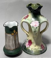 Photo showing both vases together, highlighting their relative sizes and designs.