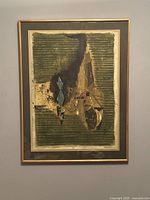 Full view of framed print hanging on wall