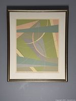 Full view of framed abstract print showing composition and frame.