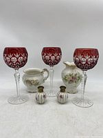 Photo showing complete set of 3 red wine glasses, 2 Johnson Brothers ceramic pieces, and 2 vintage Japan salt and pepper shakers with floral decoration