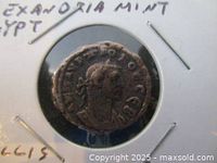 Obverse image showing portrait of Emperor Diocletian with surrounding inscription, held in a protective coin card.