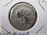 Close‐up obverse view showing head of Roma right