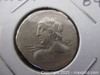 Close-up of obverse side of coin showing bust of Gaius Licinius Macer.