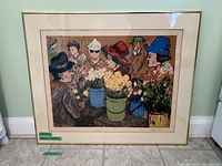 Framed lithograph showing colorful portrait of people with flower pots under a glass protective gold frame.