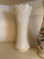 Tall white embossed Lenox porcelain vase with leaf motif