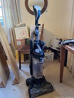 Front full view of the Eureka upright vacuum showing overall design and structure.