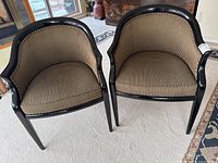 Two lounge chairs side by side showing design and upholstery