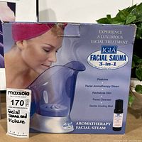 Photo of IGIA Facial Sauna 3-in-1 box showing product and features.