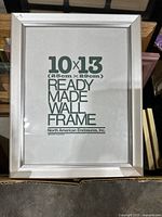 Single 10x13 inch silver metal photo frame with paper insert