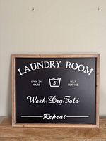 Front view of sign showing full text and frame