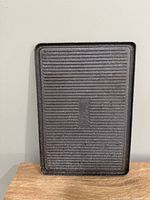Ribbed grill side showing The Rock logo
