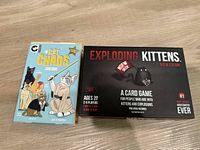 Front view of both boxed card games