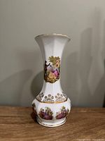 Full view of vase front showing shape and main painted scene