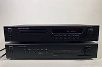 Front view of both units stacked: CD player on top, tuner below