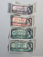 Six Canadian banknotes including $1, $2, and $10 from 1954 and 1967 showing front sides with Queen Elizabeth II portraits and varying colors.