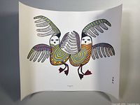 Full view of the art print showing two stylized birds with colorful geometric wings and bodies.