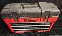 Closed view of Craftsman 3 drawer toolbox with latches and handle visible.
