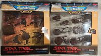 Front view of two boxed Micro Machines Star Trek Limited Edition Collector's Set playsets containing multiple starship miniatures each.