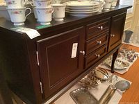 Front view showing full cabinet with top surface and placement